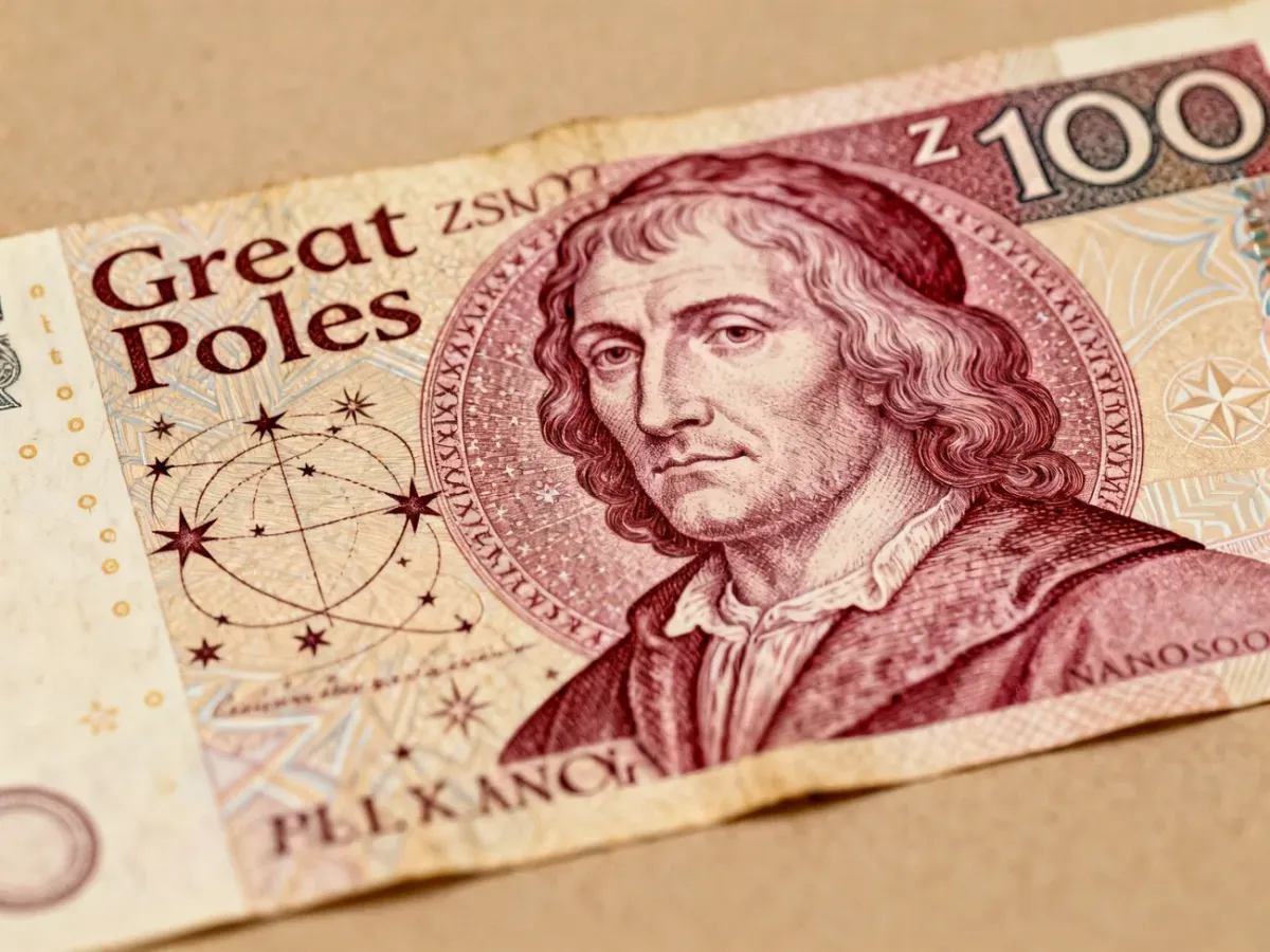 Historyczny polski banknot z portretem Mikołaja Kopernika i motywami astronomicznymi